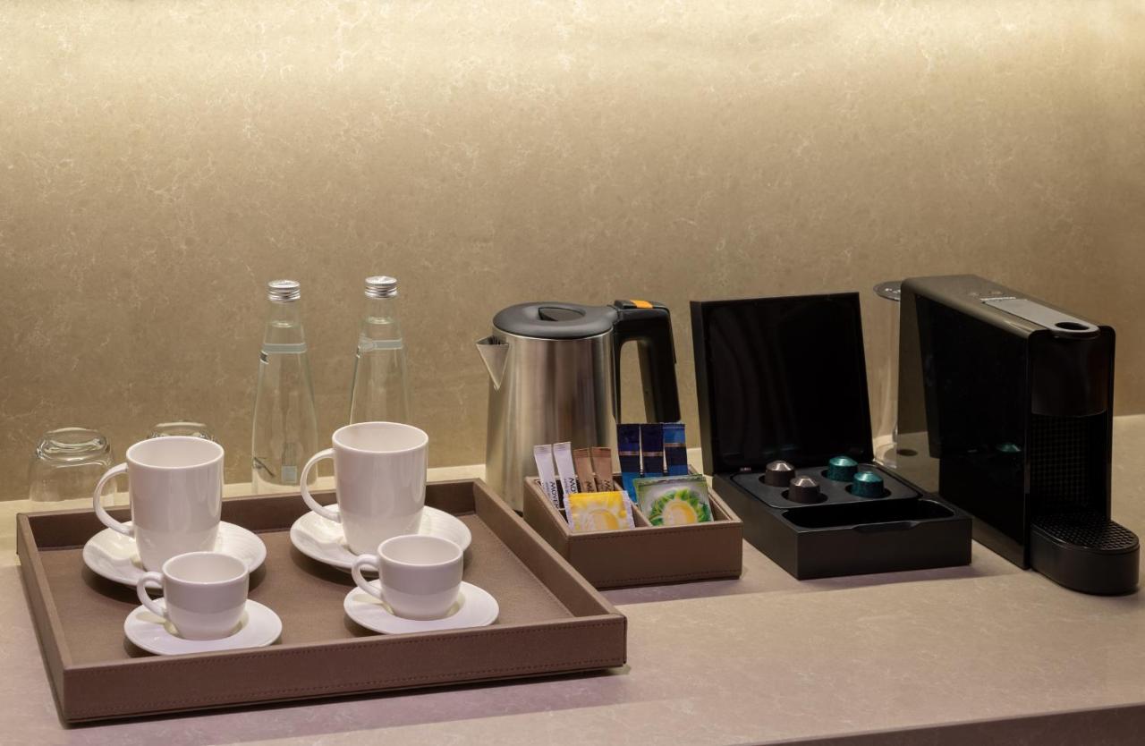 Moevenpick Hotel Istanbul Asia Airport エクステリア 写真 A Nespresso machine in a hotel room